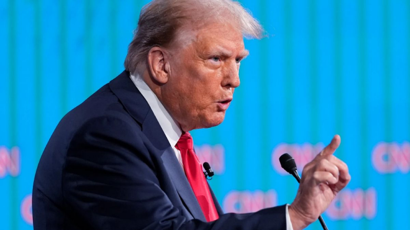 Токен-мем TRUMP вырос выше , но позже вернулся к отметке ,94